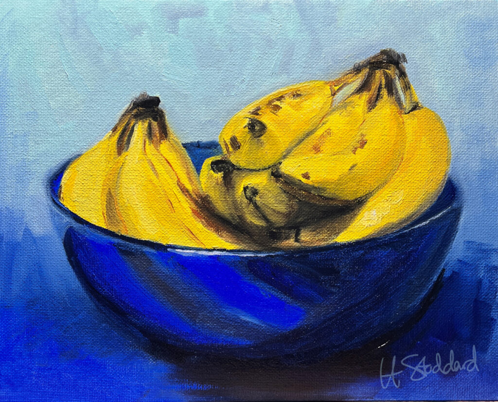 blue bowl full of bananas