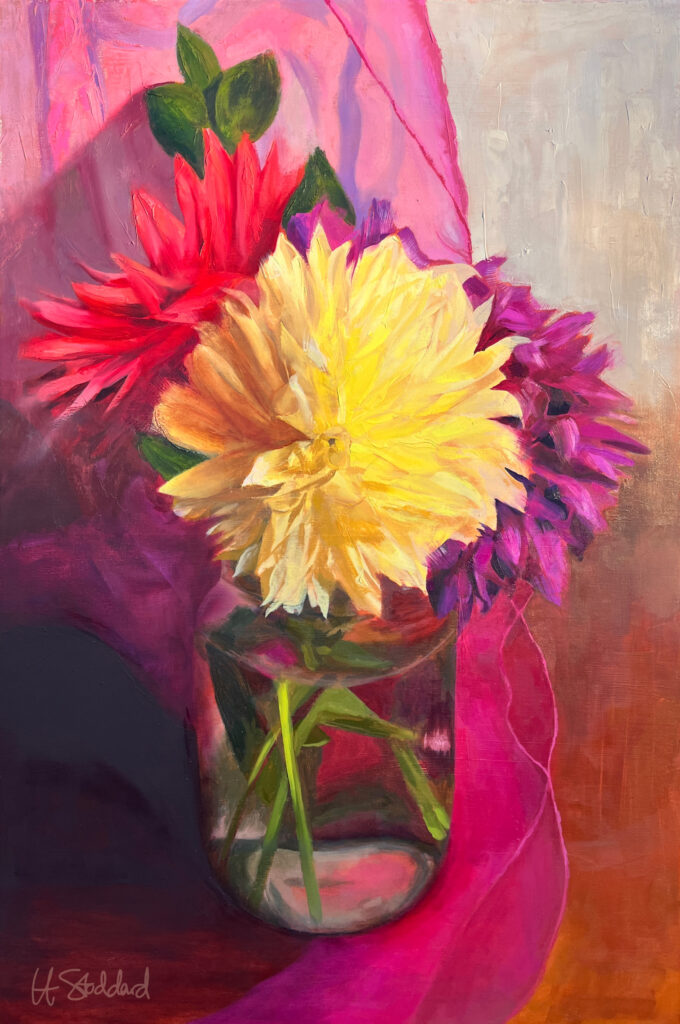 Colorful dahlias in a mason jar